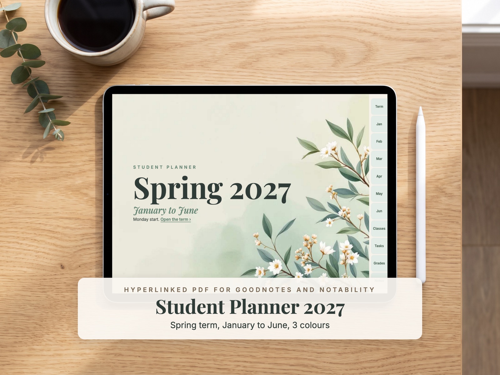 Student planner cover with watercolour leaves, shown on an iPad on a wooden desk